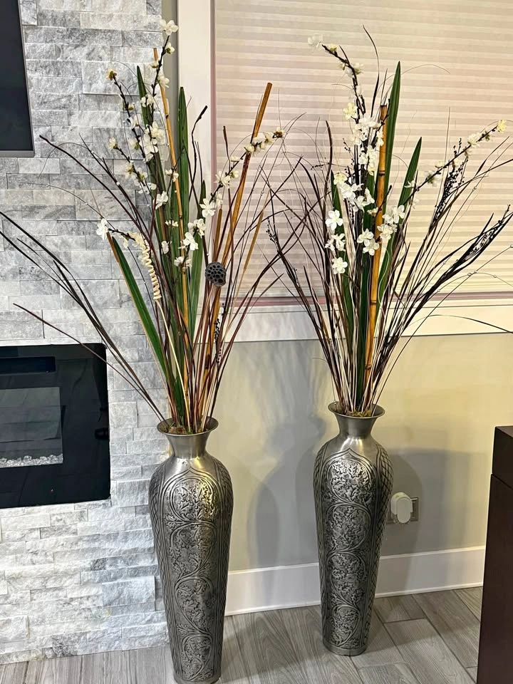 2 Metal Flower Stands with flower arrangements
