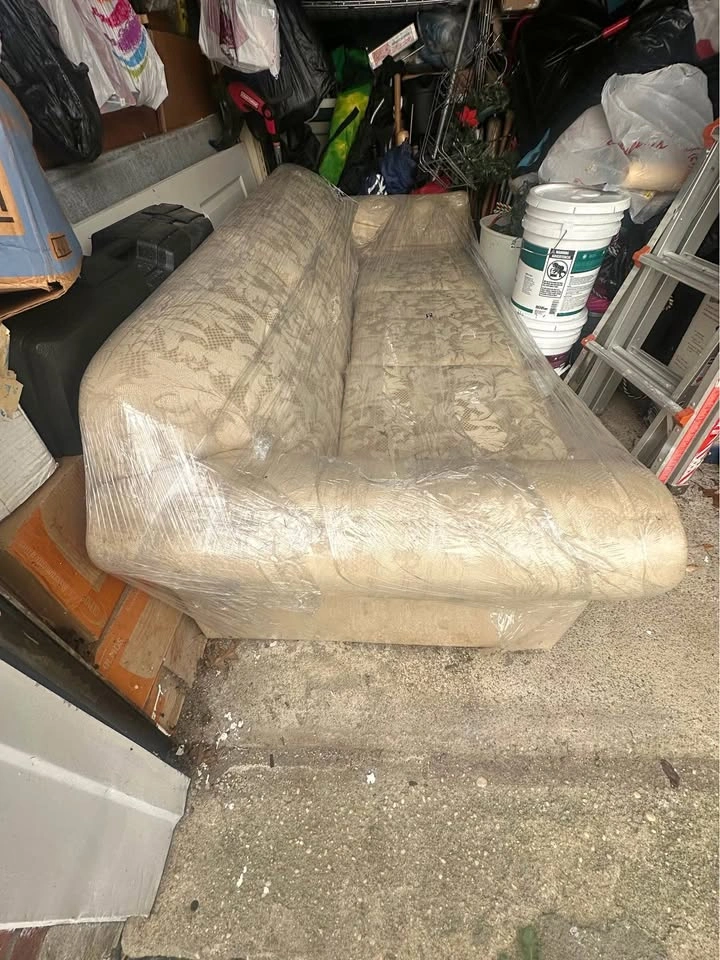 Floral Patterned Three-Seat Sofa with Pullout Bed