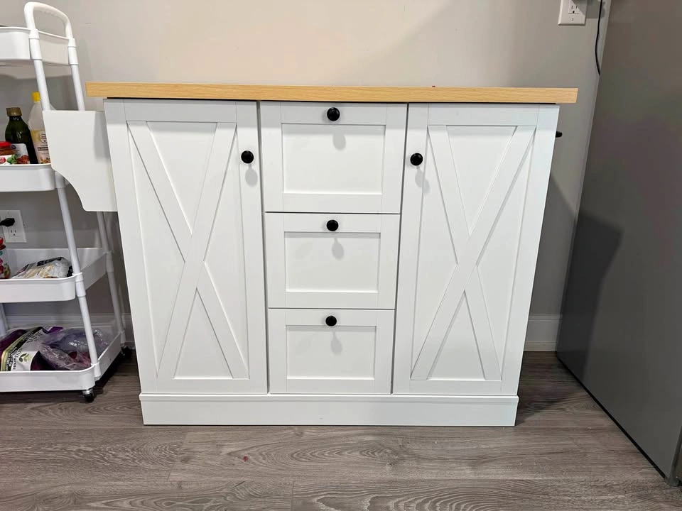 White Kitchen Island with Wood Top and Power Strip