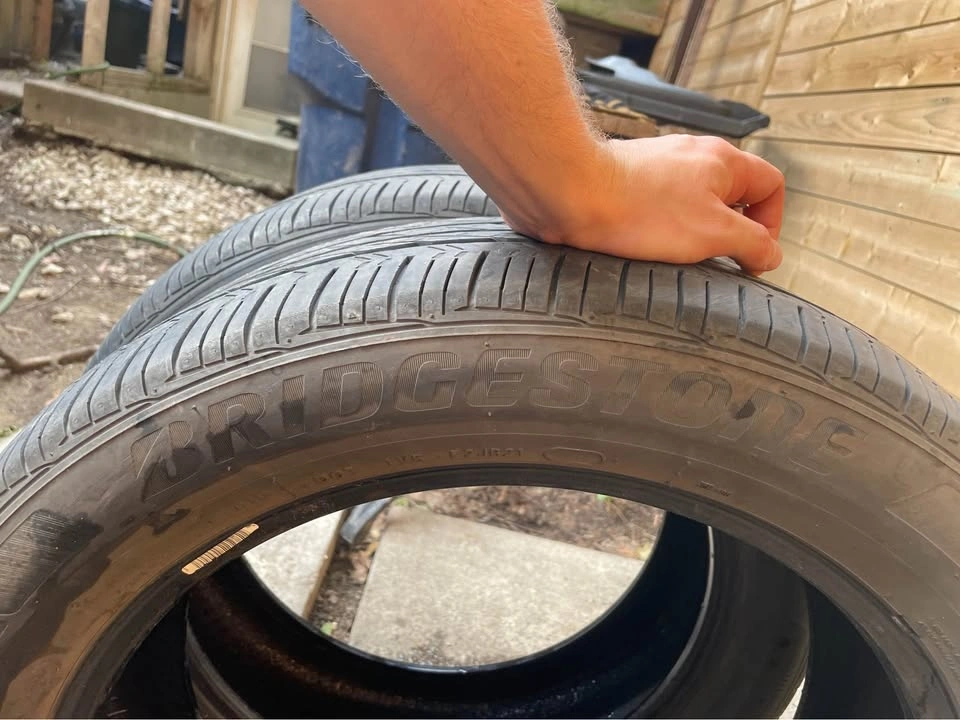 215/55R18 Bridgestone All Season Tires - Set of 2 - photo 2