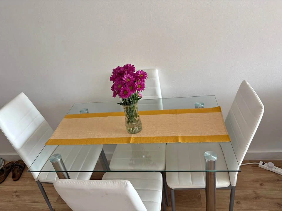 MOVING OUT SALE: Dining table with four chairs