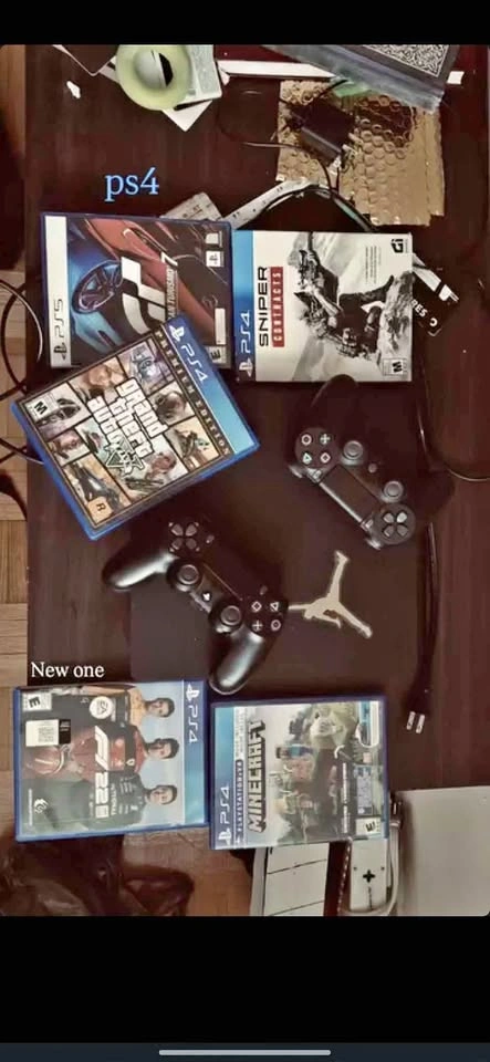 Sony PlayStation 4 Bundle with 2 Controllers and 5 Games