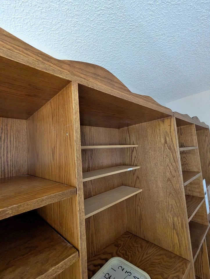 2 Oak shelving units. Each one is 79.5"Hx49"Wx18"D