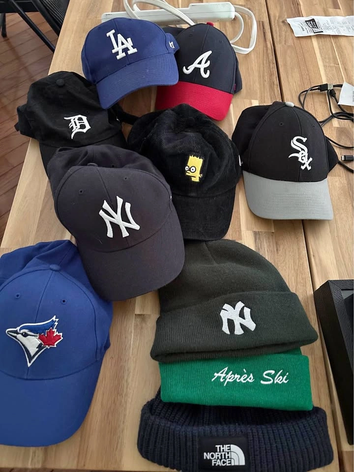 Assorted MLB Baseball Caps and Winter Beanies