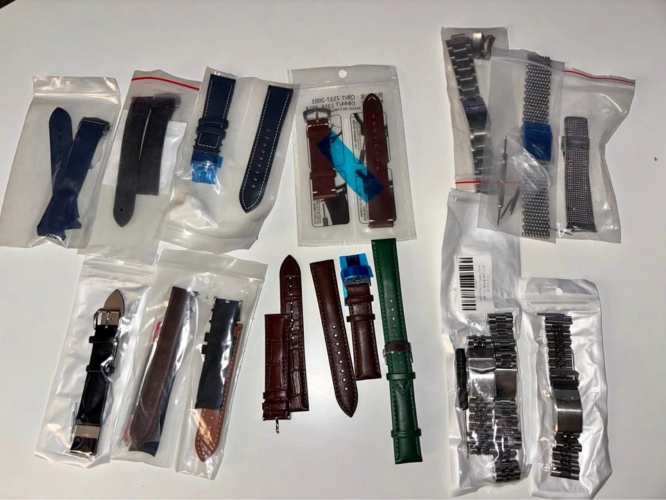 Assorted Watch Straps and Metal Bracelets
