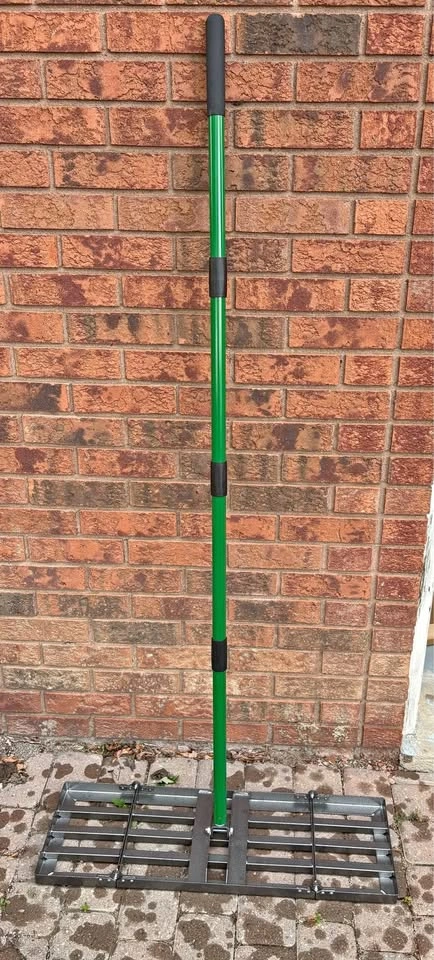 Lawn leveling Rake