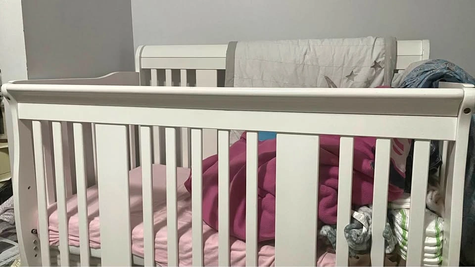 Crib with mattress for baby and toddler