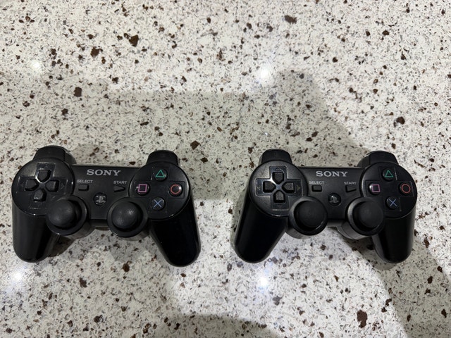 2 Genuine Sony PS3 DualShock 3 Controllers