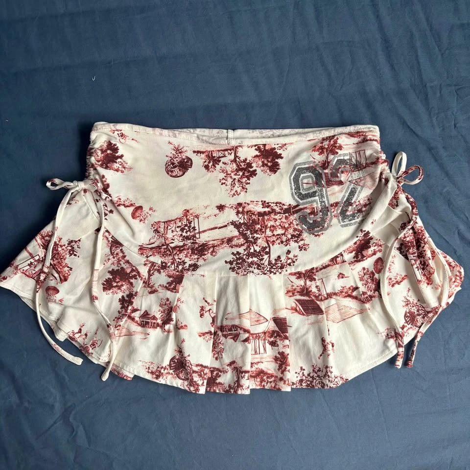 brand new white skort with pink/red details