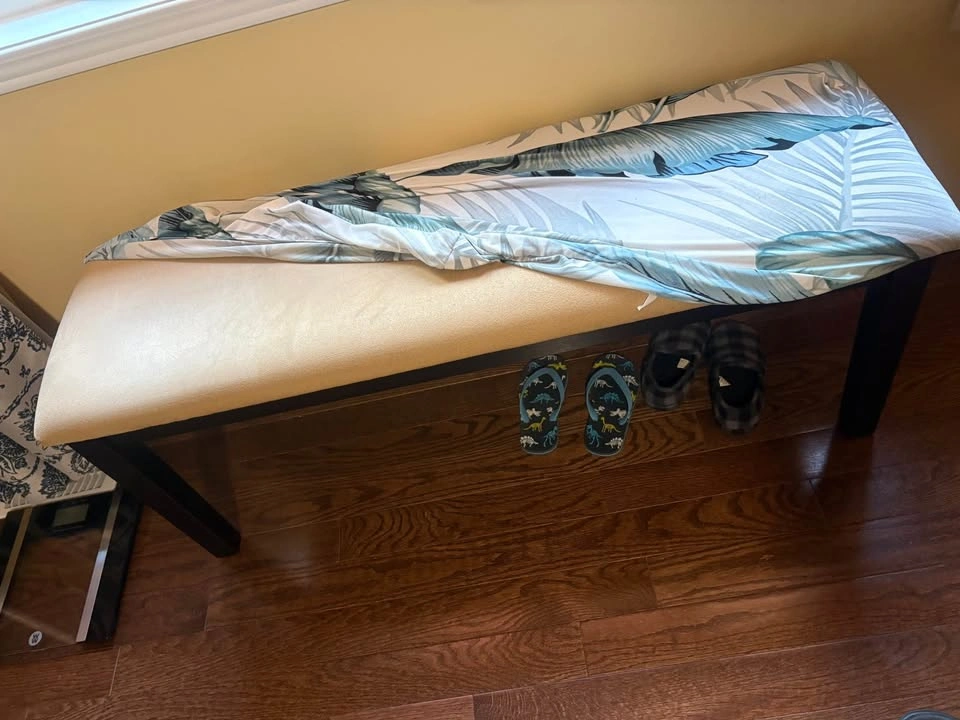 Wooden bench with cushion