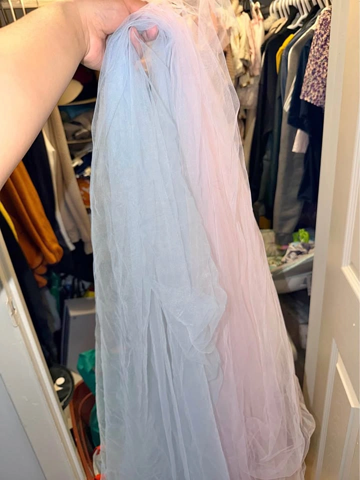 Sheer curtain backdrop gender reveal pink and blue