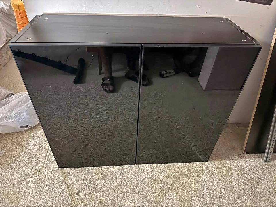 IKEA Wall Cabinet with Black Glass Doors