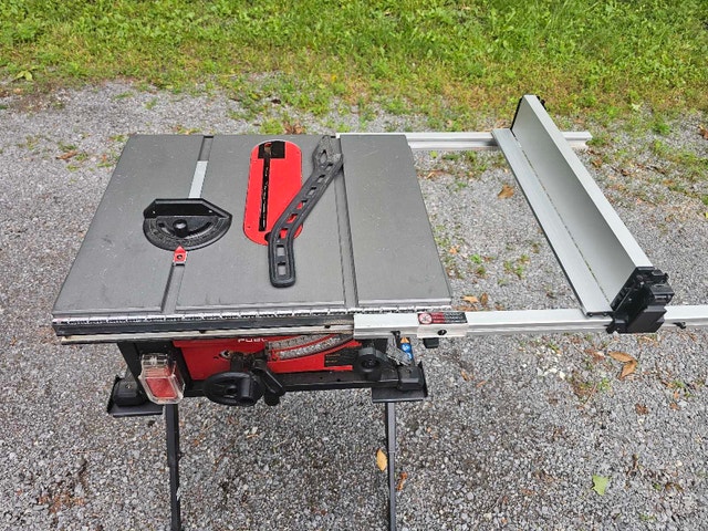 Milwaukee M18 Fuel cordless table saw with folding stand - photo 2