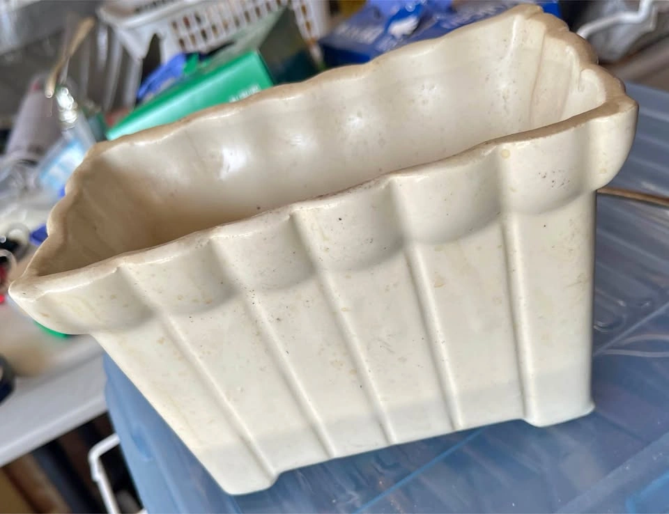 Vintage white planter with feet