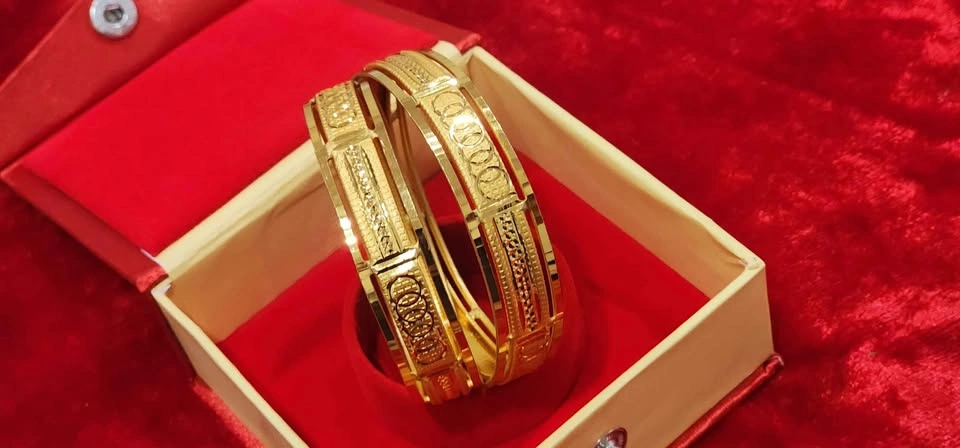 Ladies silver bangle with 1 gram gold polish - photo 2