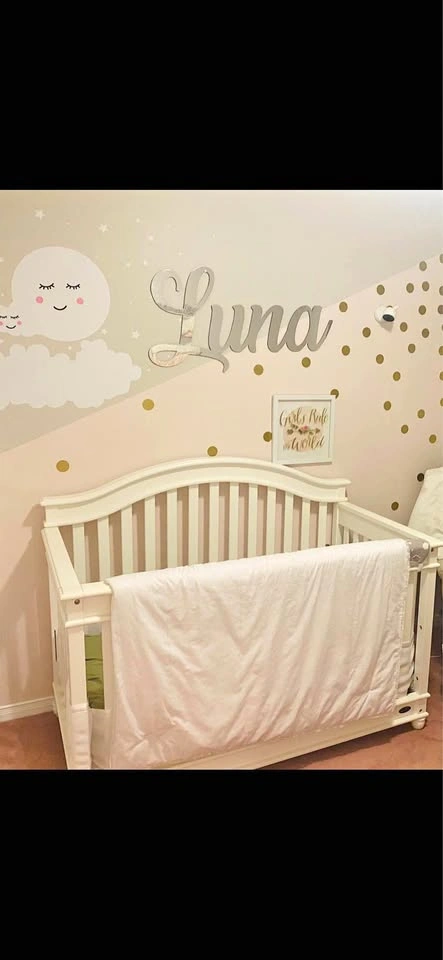 White solid wood crib
