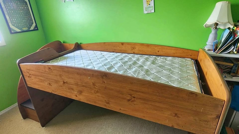 Loft bed with stairs and mattress