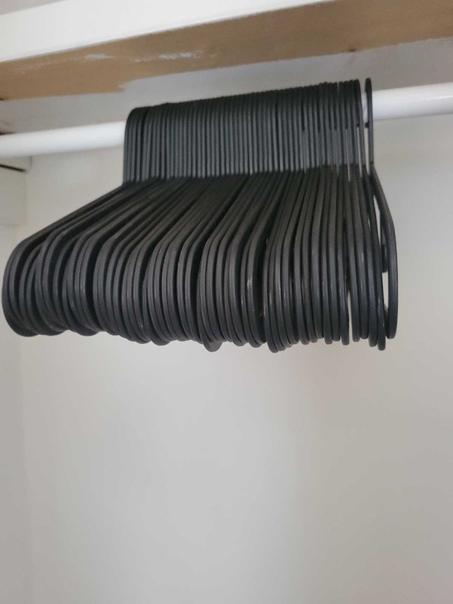 $0.20 each Black Plastic Clothes Hangers