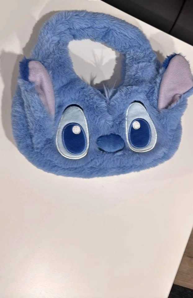 Stitch hand bag