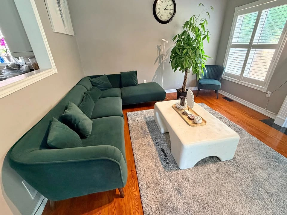 3 seater Green sofa with chaise and cushions + green accent chai
