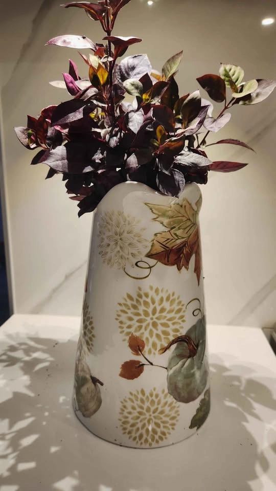 Upcycled water jug planter with plant - photo 3
