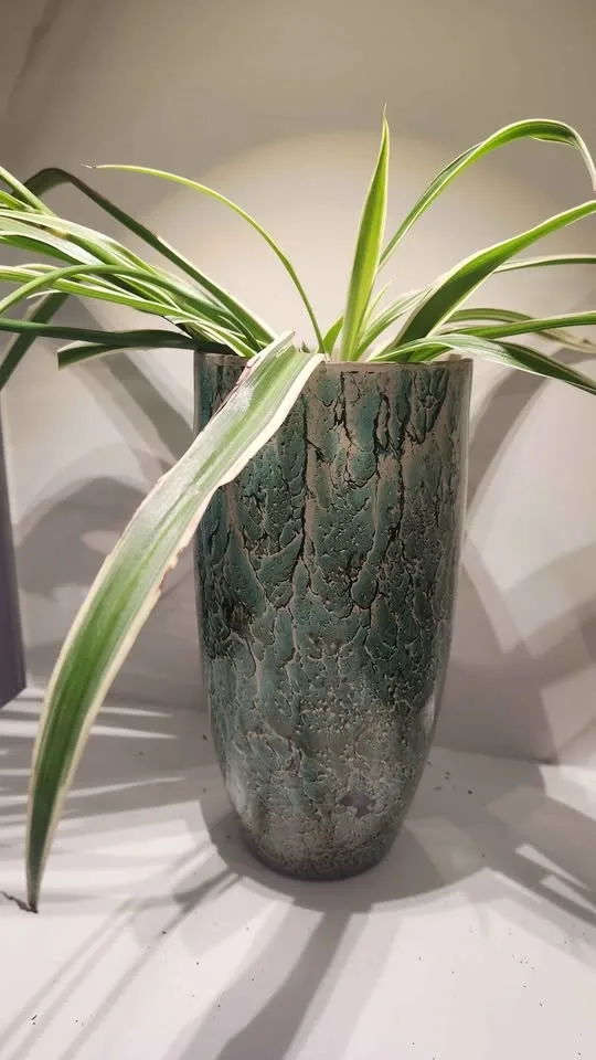 Turquoise vase upcycled into planter with plant - photo 2