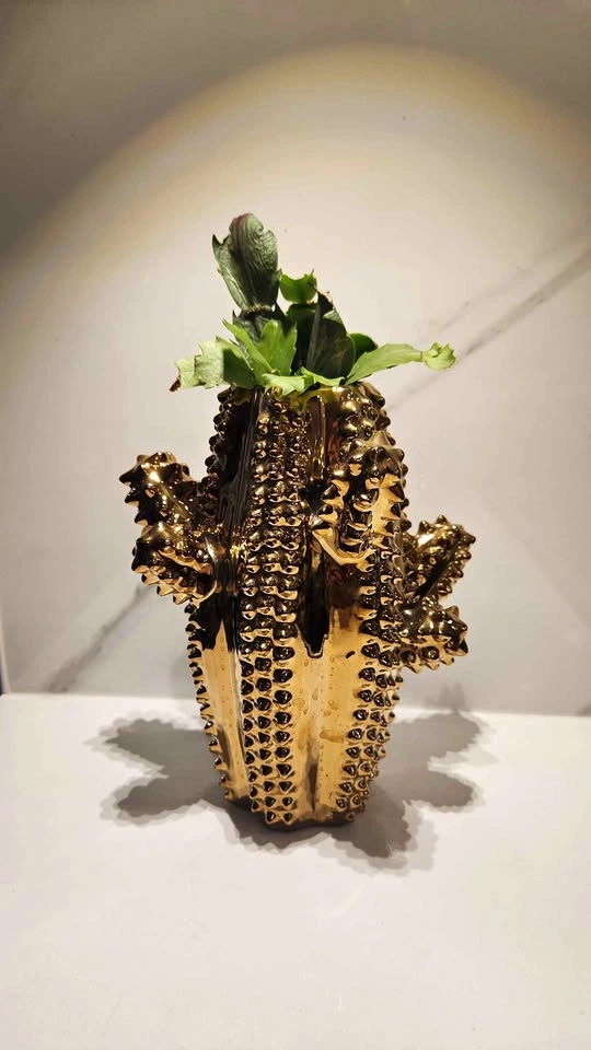 Upcycled gold cactus vase planter with plants
