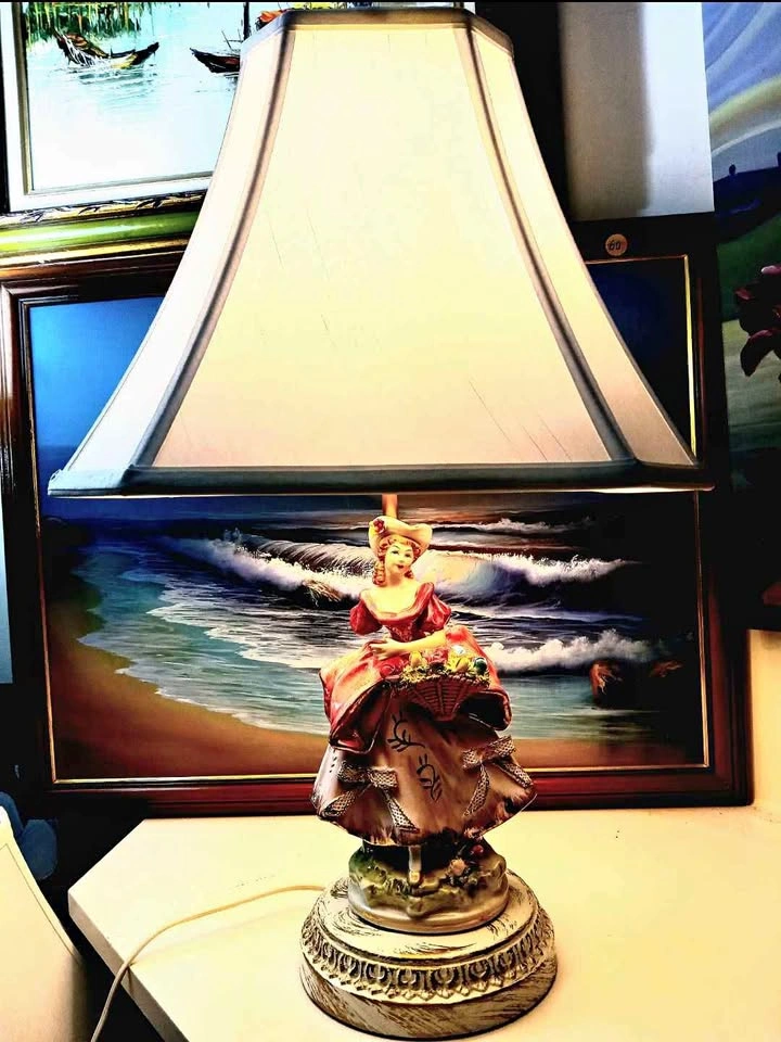 Pair of tall antique porcelain figurine table lamps