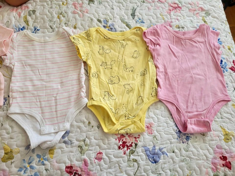 6 Onesies size 6M
