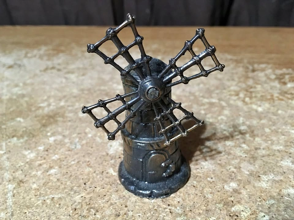 VINTAGE DIECAST METAL PENCIL SHARPENER WINDMILL 3.5"