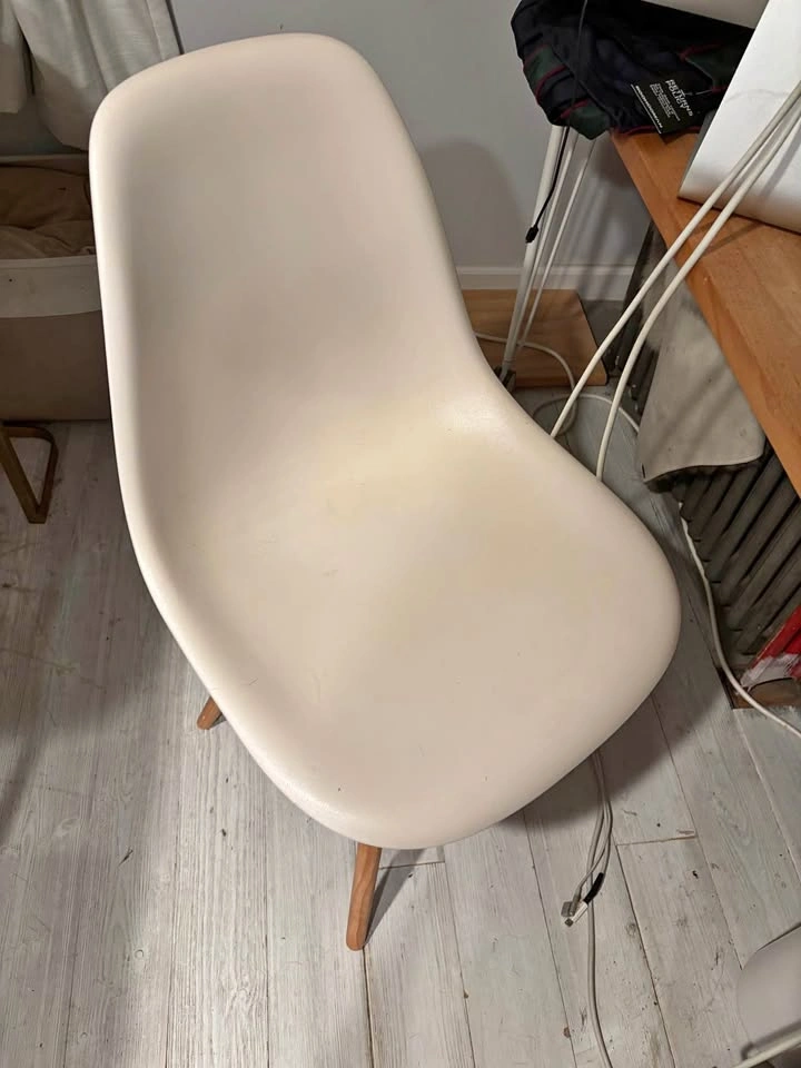 White Eames style chair with wood legs