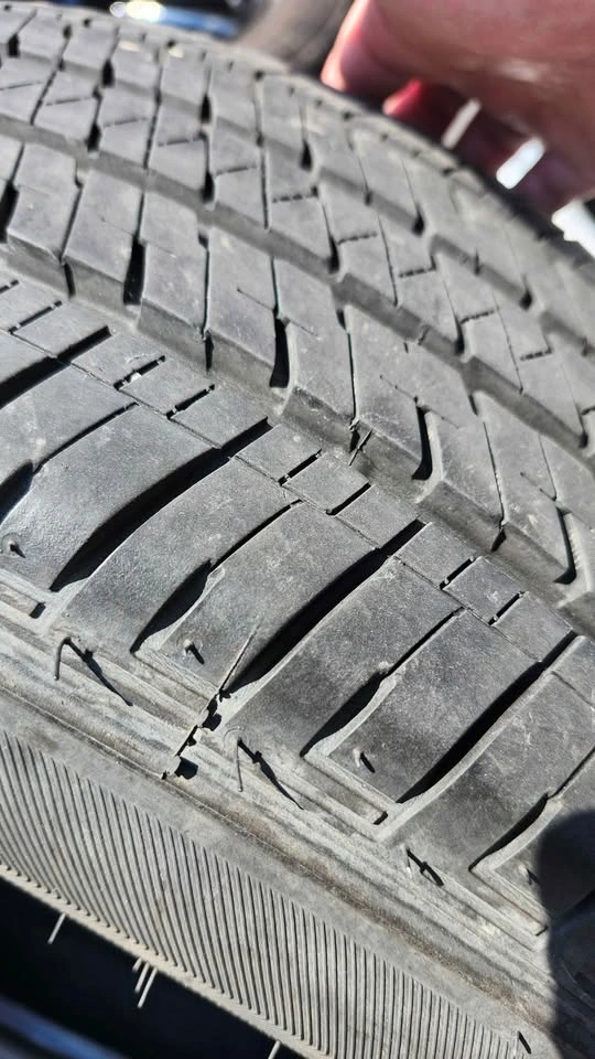 two 215/55/17 bridgestone all season tires 85% tread - photo 4