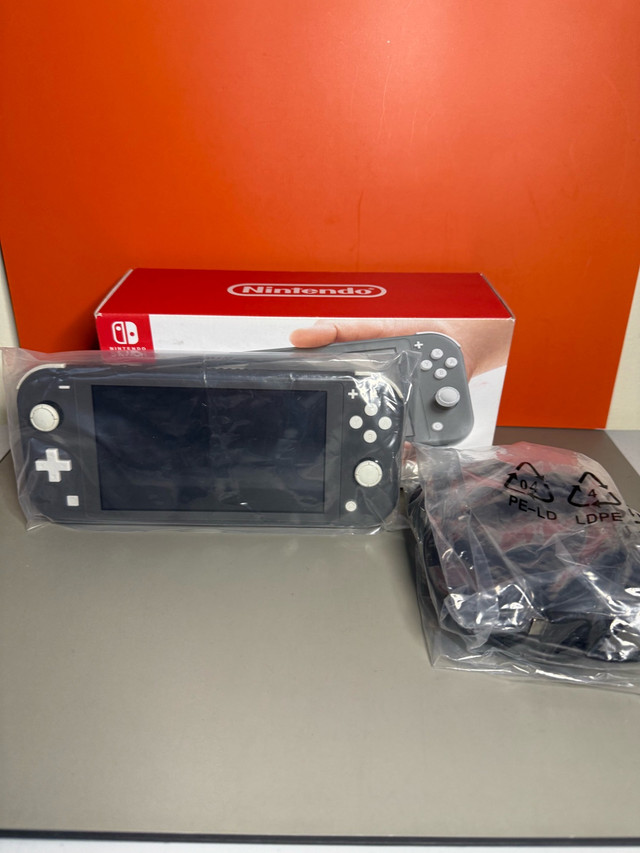 Nintendo Switch Lite w/ Box & 128GB SD Card