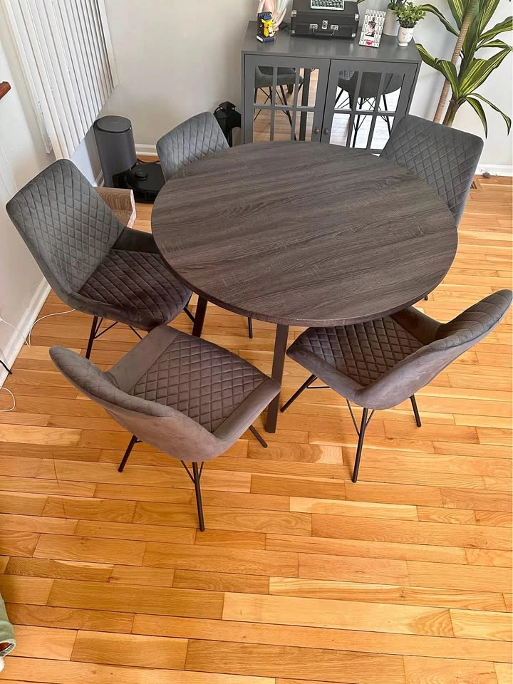 Wooden dining table with velvet chairs