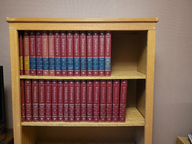Encyclopaedia Britannica 32-Volume Set with Bookcase – Excellent