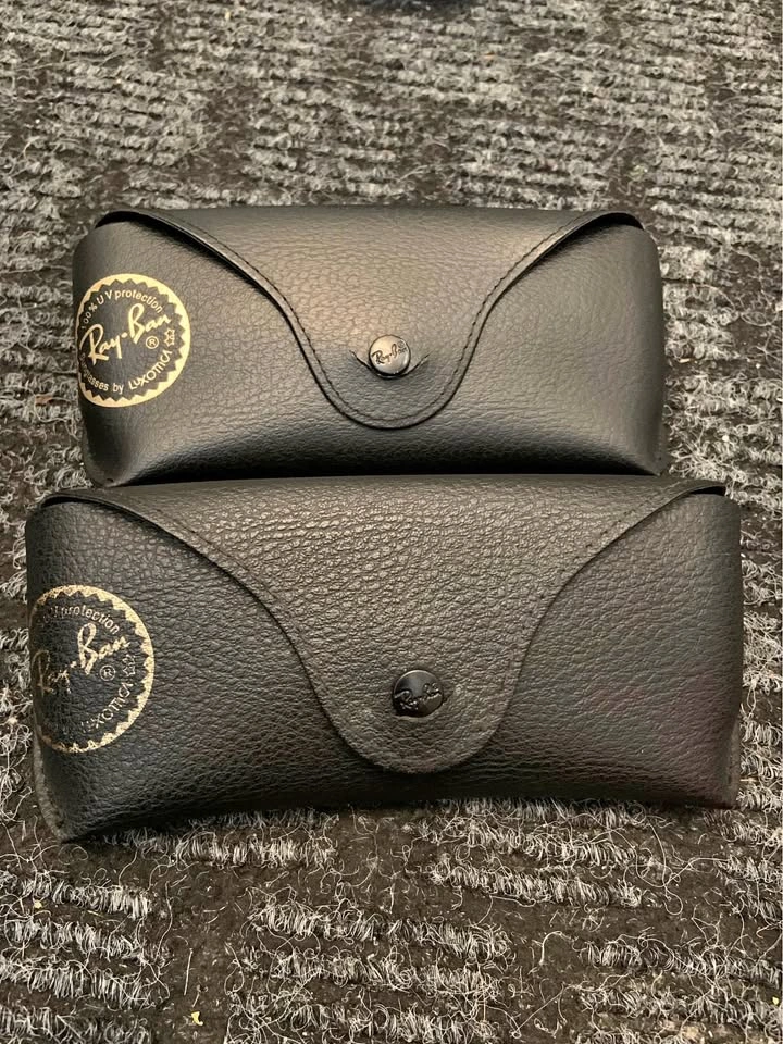 Two Ray-Ban sunglasses cases