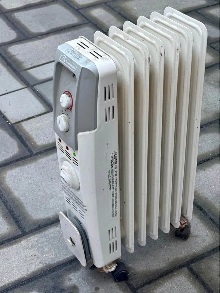 Garrison brand 7-fin oil-filled portable radiator heater