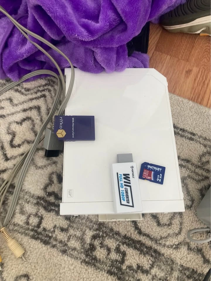 Nintendo Wii with cords, accessories, remotes, and games - photo 2