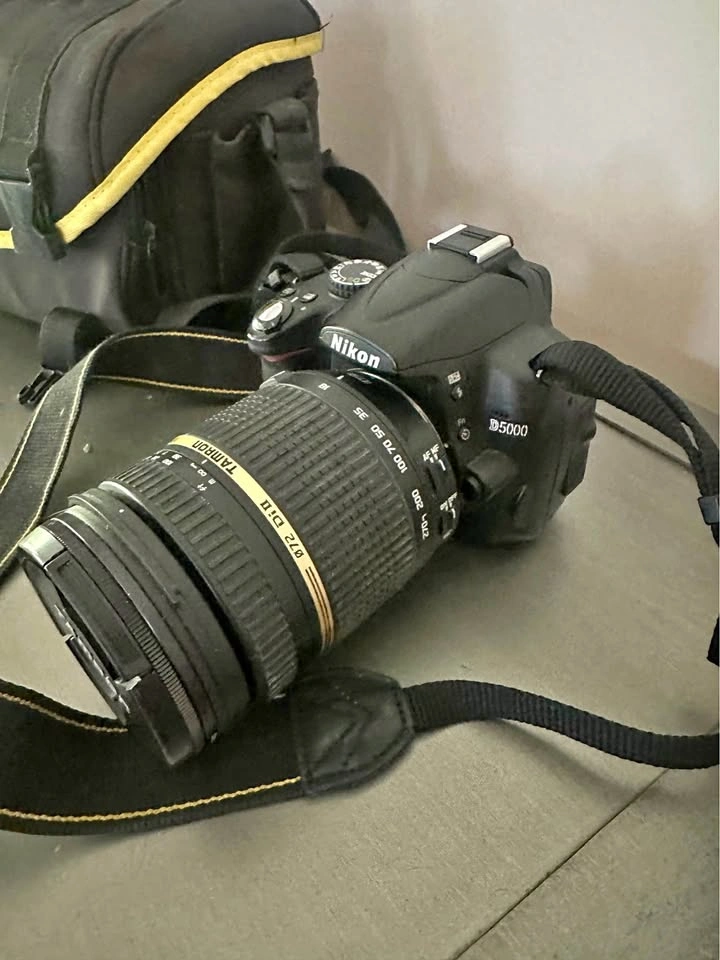 Nikon D5000 with Tamron 18-270 lens, case, and filter