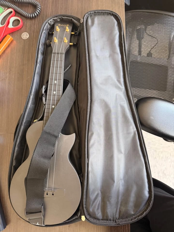 Brand New Enya Ukulele with case and capo - photo 2