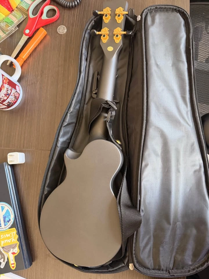 Brand New Enya Ukulele with case and capo - photo 4