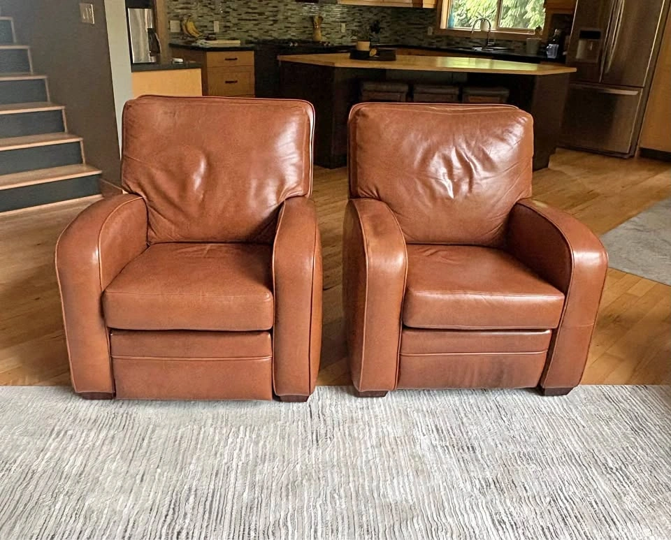Two very comfy leather recliners