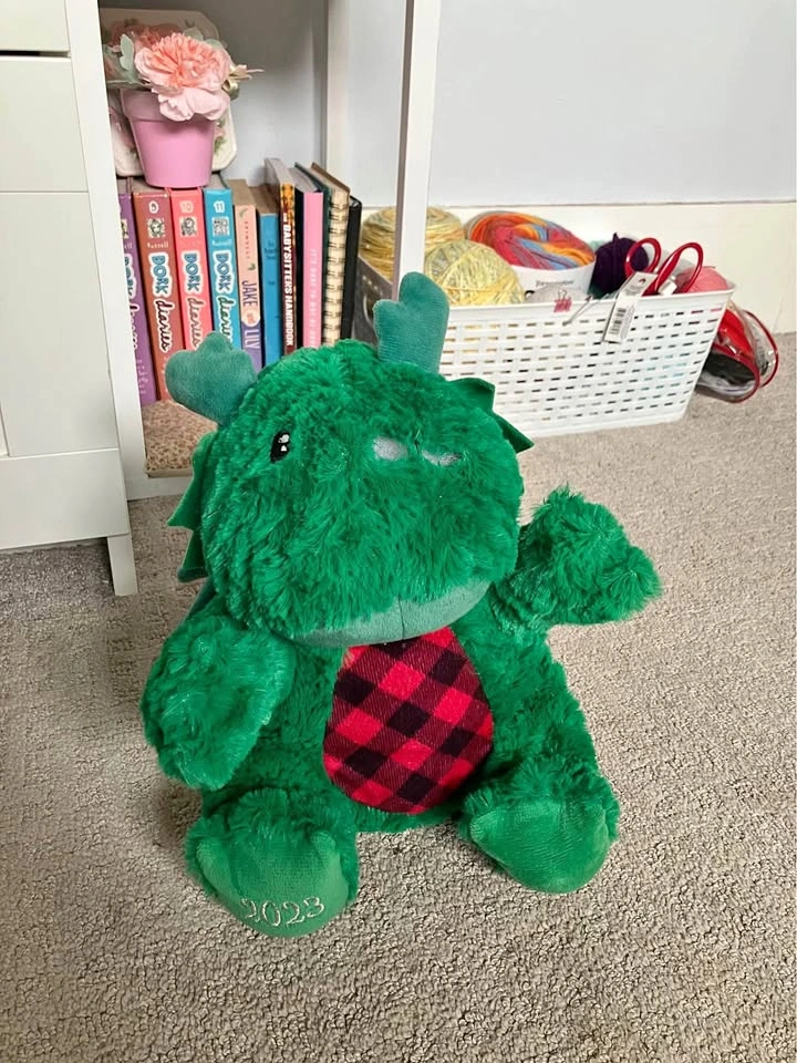 Free dinosaur stuffed dog toy