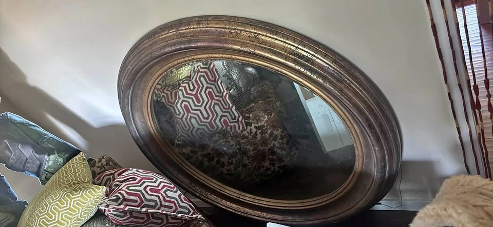 Circular distressed gold frame mirror