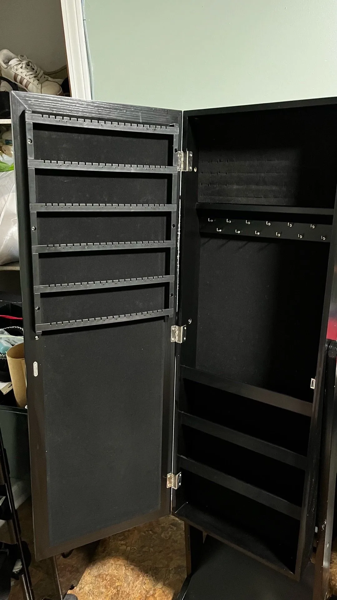 Mirror with jewelry storage