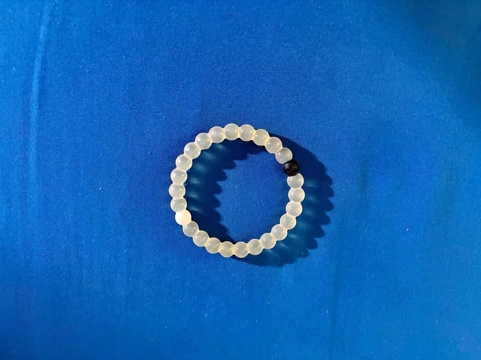 Stretch Beaded Bracelet in Translucent White with Single Black A
