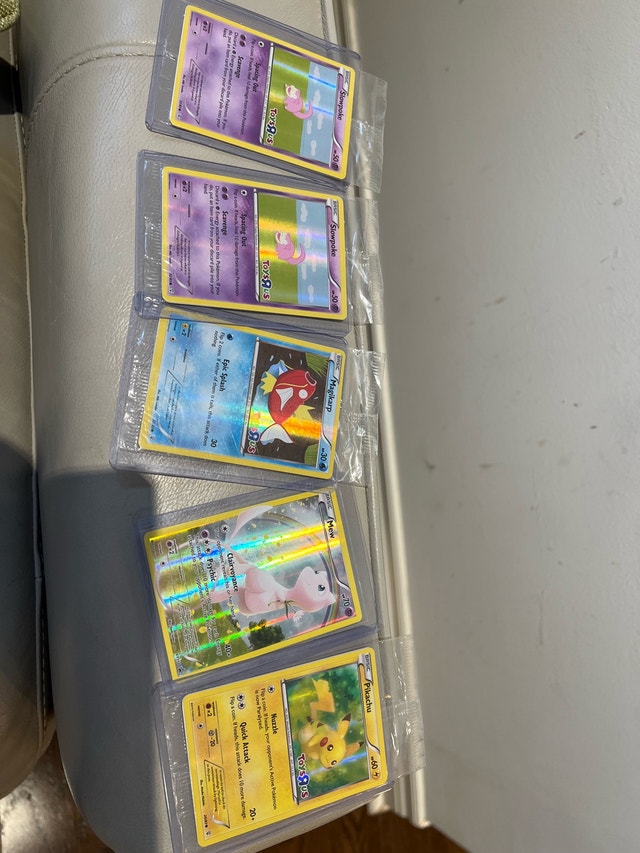 Rare Toys “R” Us Pokémon cards plus XY MEW