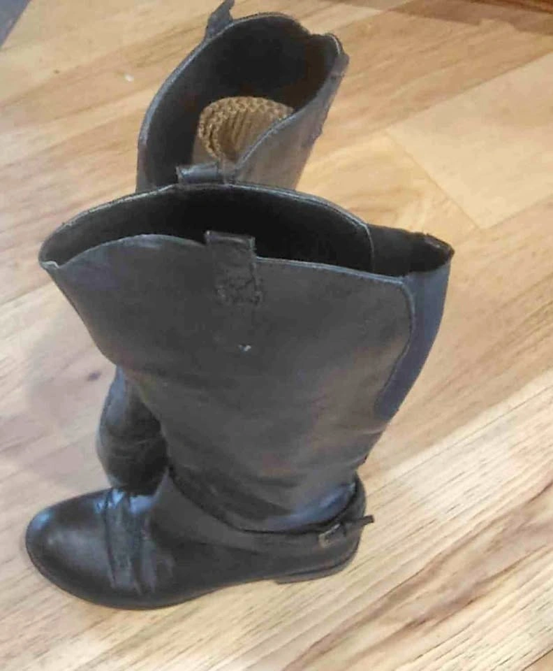 Tall black leather boots