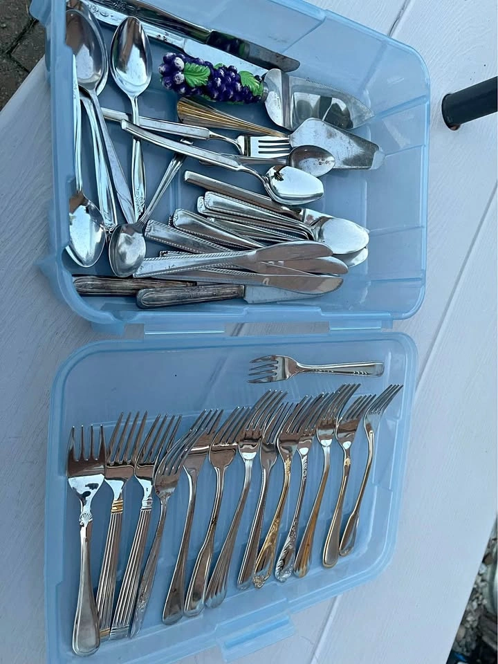 Mix of cutlery lots of forks a few spoons knives