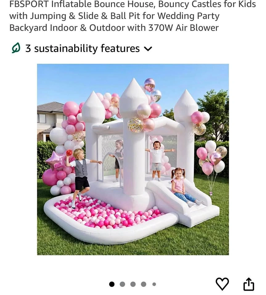 White bouncy jumping castle with blower